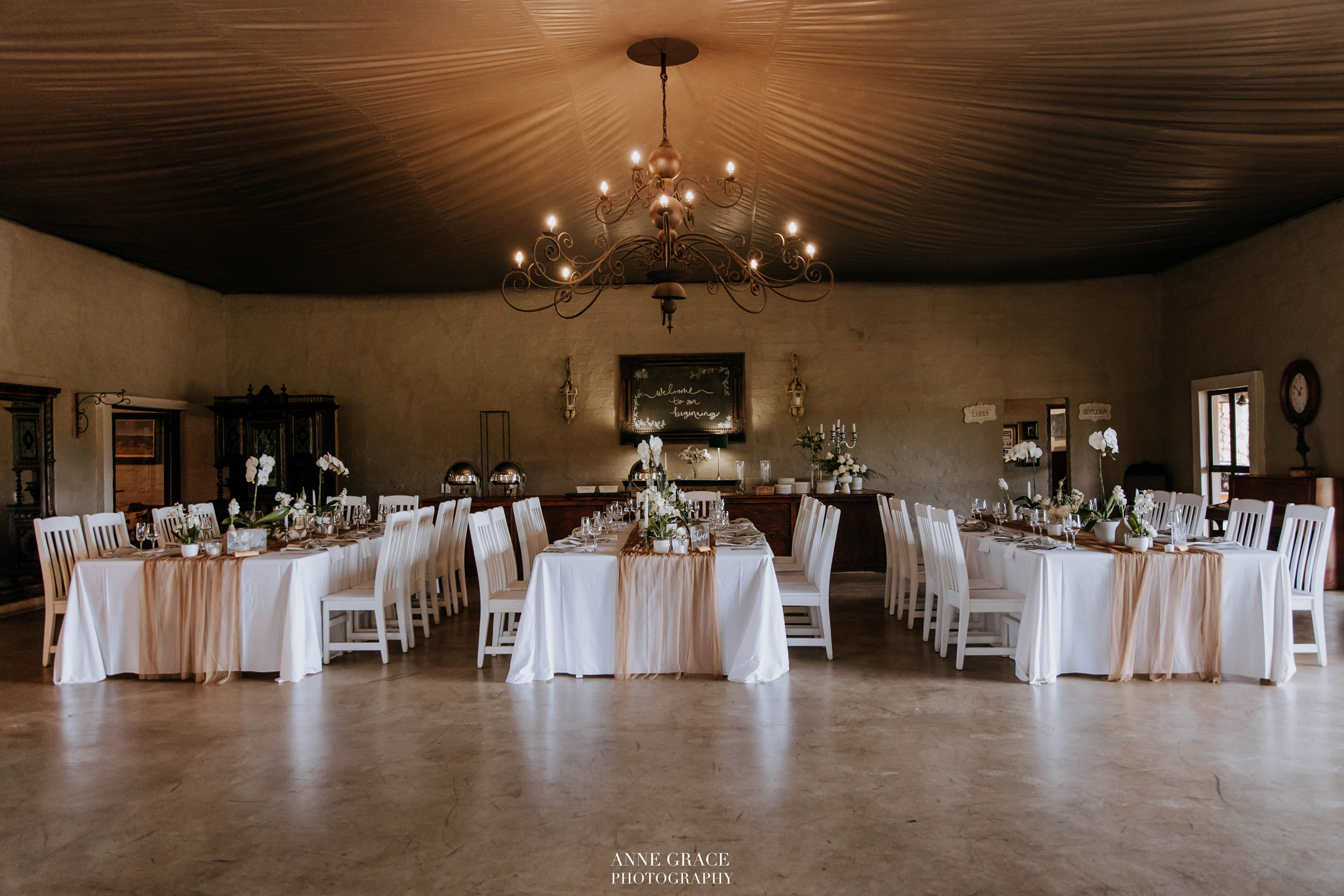 Table decor setup inside the smaller wedding venue hall at Lezar Opstal Heidelberg