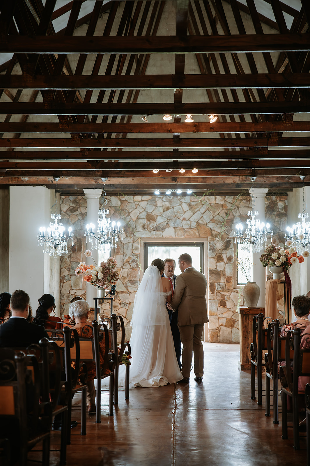 Bride and groom standing at the altar during wedding ceremony at Lezar Opstal Wedding Venue Heidelberg